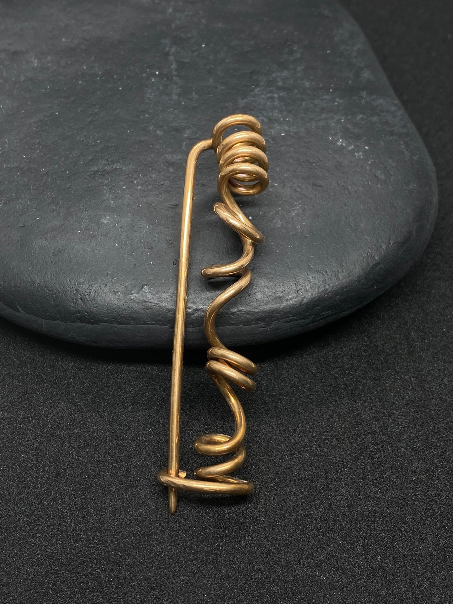 Spiral brooch in bronze